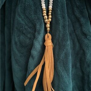Elegant Gold and White Beaded Necklace with Tassel